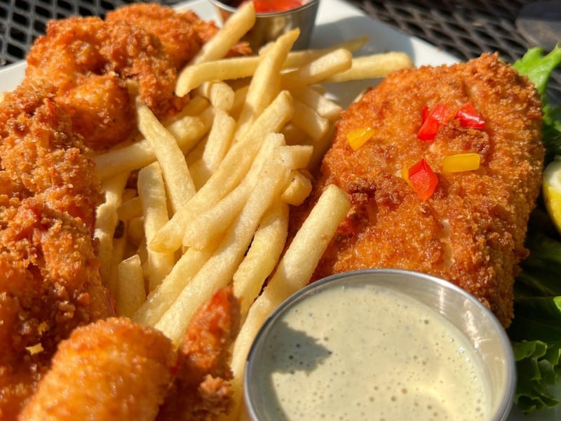 Fried shrimp and fish with fries
