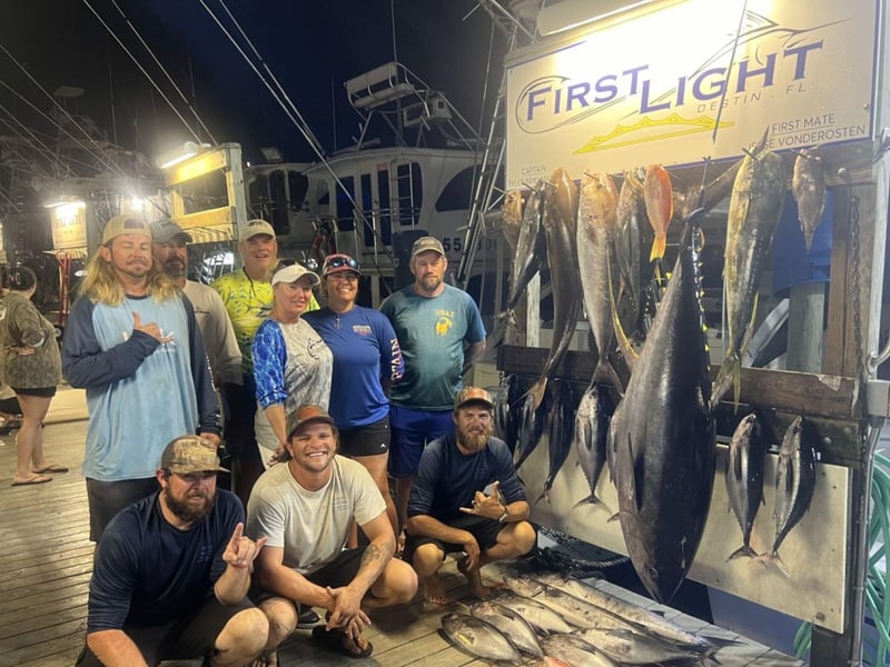 A group with their catches on the dock in Destin, Florida