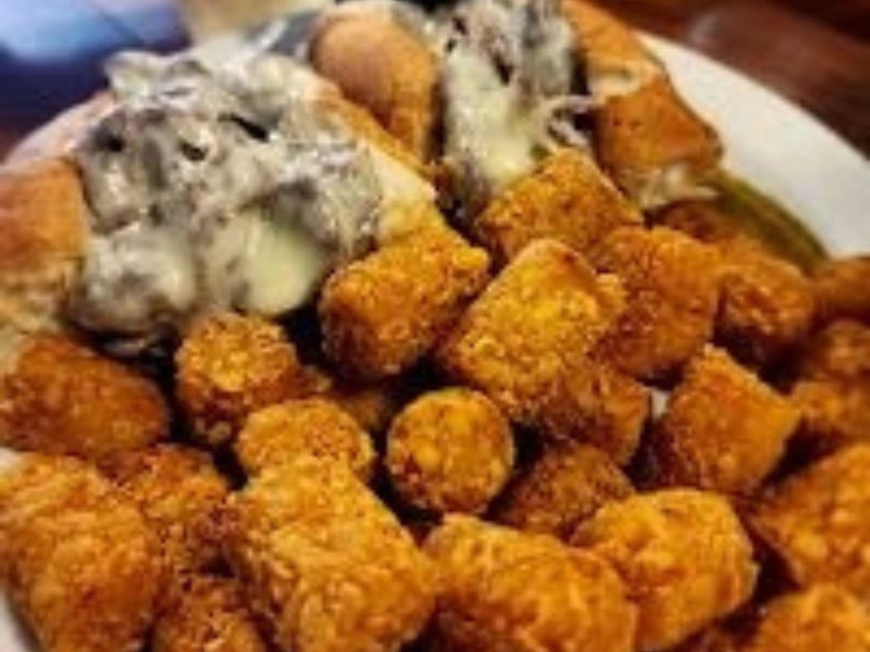 Tater tots and a sandwich at Johnyy McTighes