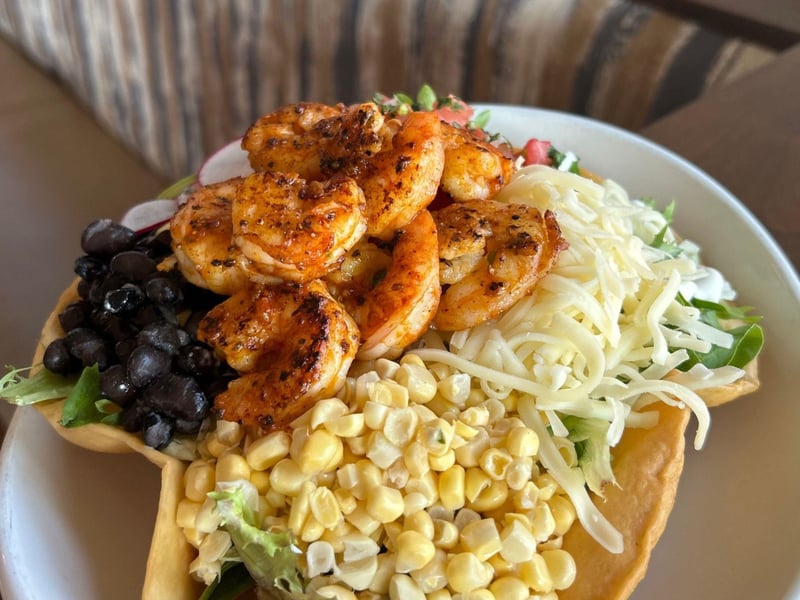 A taco salad with shrimp