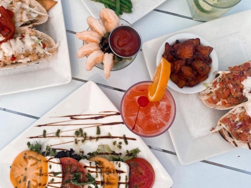 The caprese salad, shrimp cocktail and fish tacos