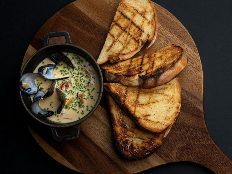 Mussels mariniere with grilled sourdough