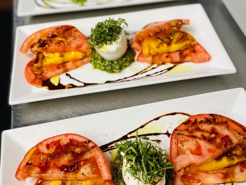 The burrata salad from Restaurant Paradis in Rosemary Beach, Florida