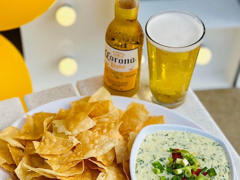 Beer with chips and quesio at Shades Bar and Grill on Highway 30A