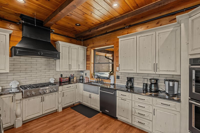 Kitchen area at Black Bears  Biscuits Lodge, a 6 bedroom cabin rental located in Pigeon Forge
