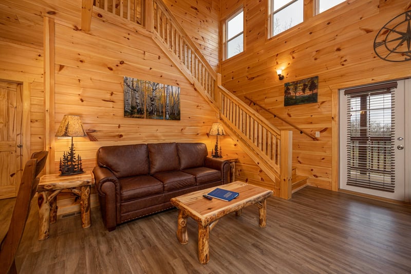 Living room seating at Mountain Pool  Paradise, a 3 bedroom cabin rental located in Pigeon Forge