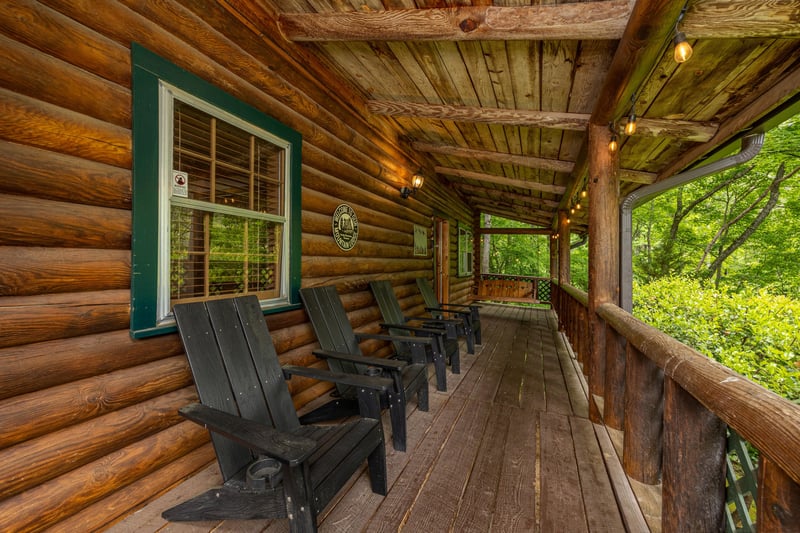 Deck with Adirondack chairs at Moonlit Mountain Lodge