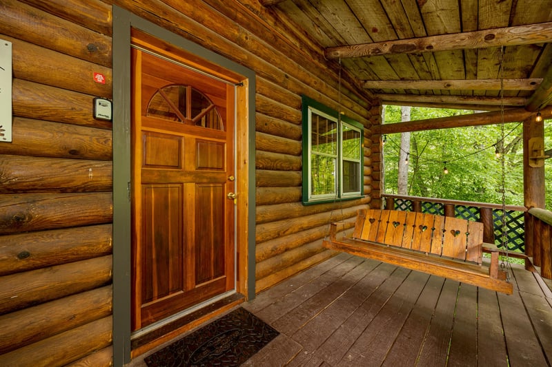 Porch Swing at Moonlit Mountain Lodge