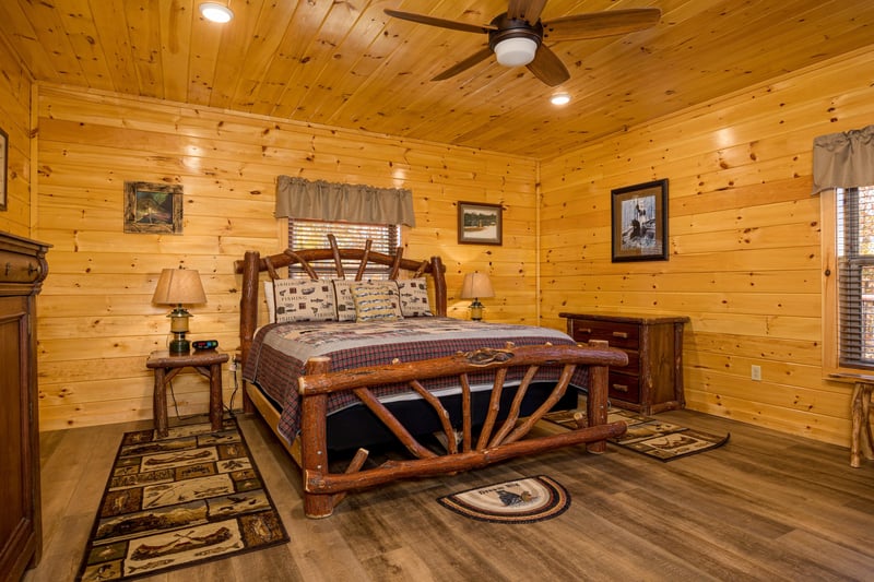 Bedroom With Log Furniture at Anglers Ridge