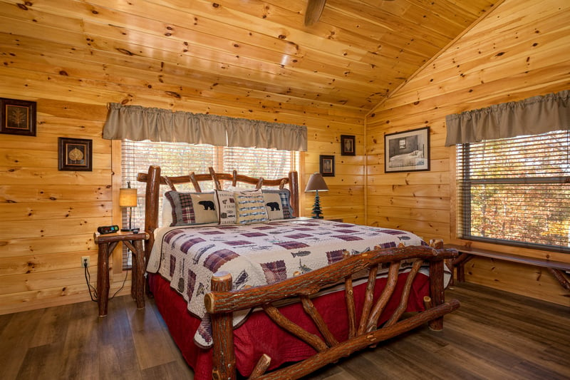 Bedroom With Log Furniture at Anglers Ridge