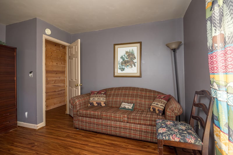 Bedroom with Sofa at Mountain Moonshine