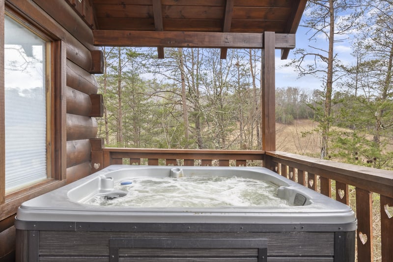 Hot Tub at always  forever a 1 bedroom cabin rental located in pigeon forge