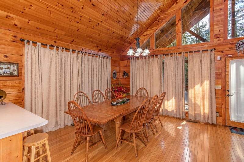 Dining room with seating for eight at Bear Country, a 3bedroom cabin rental located in Pigeon Forge