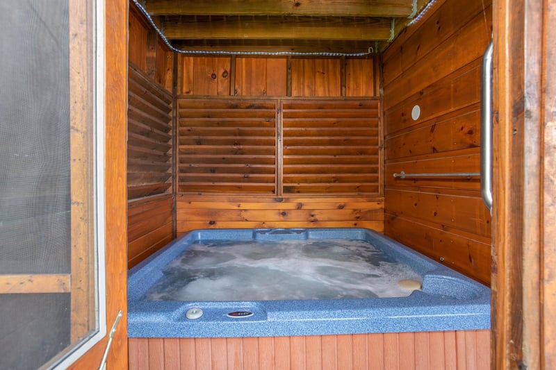 Enclosed hot tub for privacy at Bear Country, a 3bedroom cabin rental located in Pigeon Forge