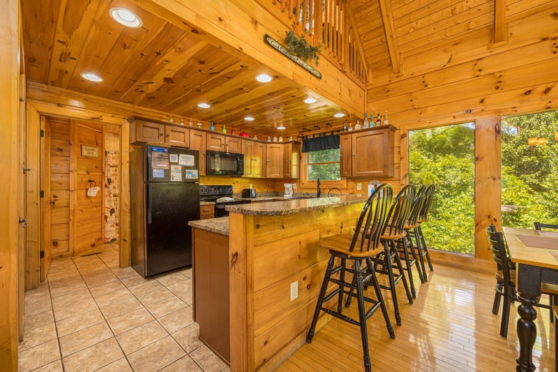 Kitchen seating at Moonbeams  Cabin Dreams, a 3 bedroom cabin rental located in Pigeon Forge