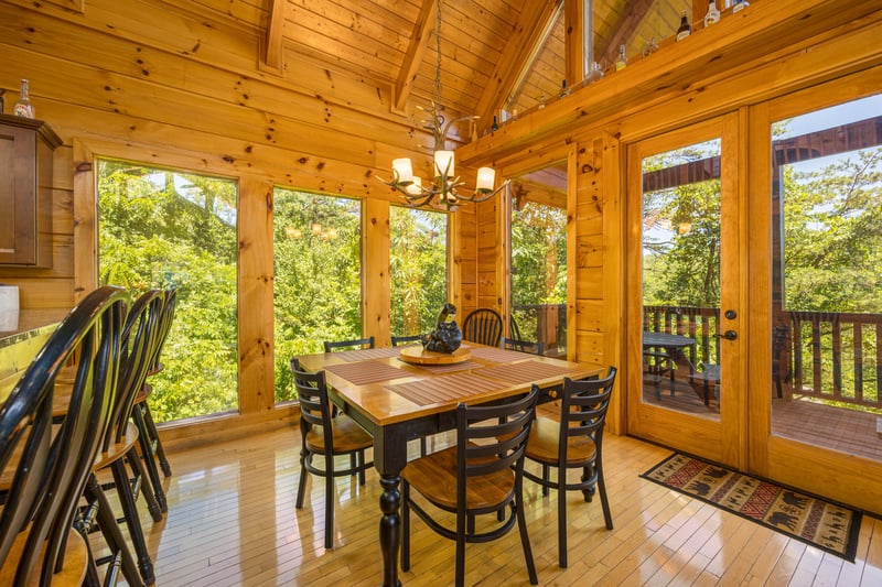 Kitchen table at Moonbeams  Cabin Dreams, a 3 bedroom cabin rental located in Pigeon Forge