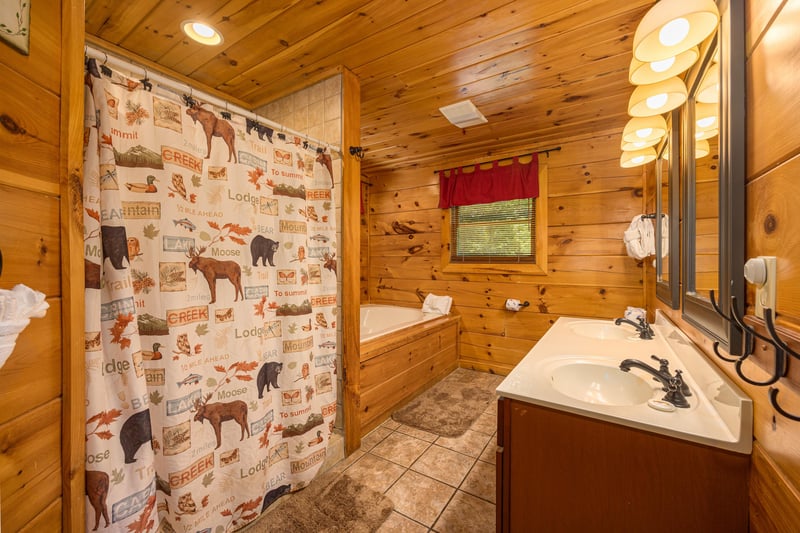 Bathroom at Moonbeams  Cabin Dreams, a 3 bedroom cabin rental located in Pigeon Forge