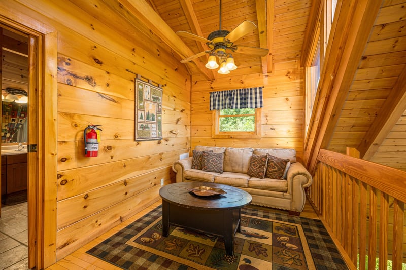 Loft seating at Moonbeams  Cabin Dreams, a 3 bedroom cabin rental located in Pigeon Forge