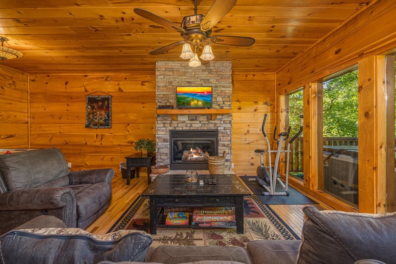 Sitting area and exercise bike at Moonbeams  Cabin Dreams, a 3 bedroom cabin rental located in Pigeon Forge