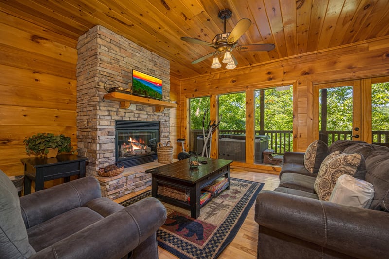 Deck view from sitting area at Moonbeams  Cabin Dreams, a 3 bedroom cabin rental located in Pigeon Forge