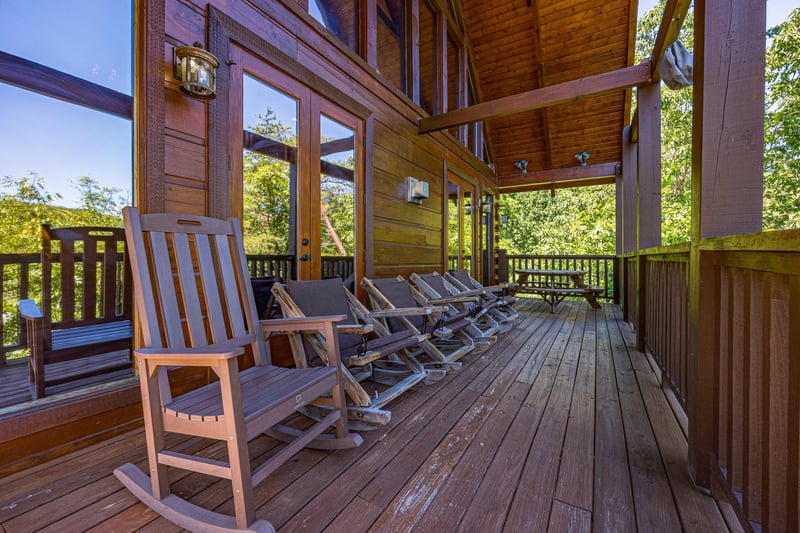 Wooden rocker at Moonbeams  Cabin Dreams, a 3 bedroom cabin rental located in Pigeon Forge