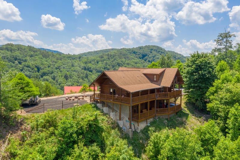 Looking back at the cabin and the fire pit at Gods Country, a 4 bedroom cabin rental located in Pigeon Forge