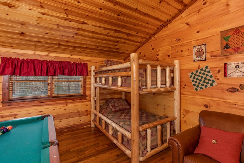 Bunk beds in the loft at Moonshiners Ridge, a 1bedroom cabin rental located in Pigeon Forge