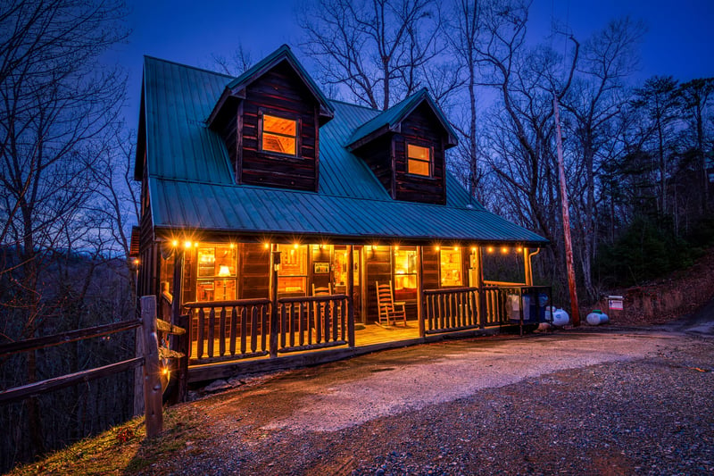 Moonshine Memories at night, a 2 bedroom cabin rental located in Gatlinburg