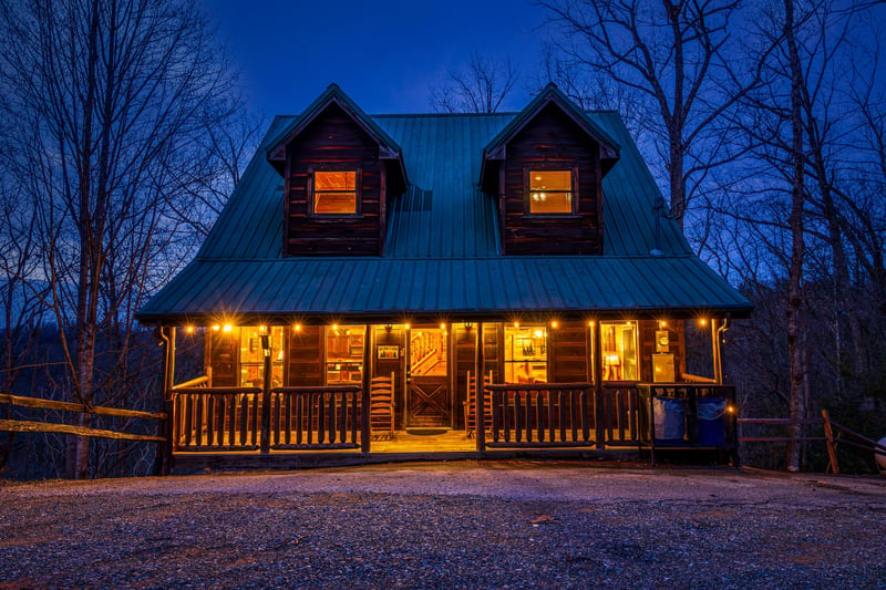 Moonshine Memories at night, a 2 bedroom cabin rental located in Gatlinburg