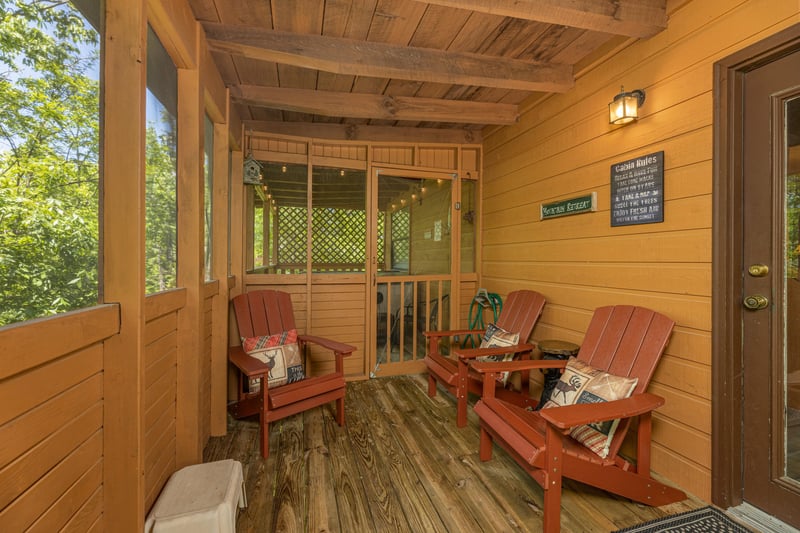 Screened in porch at Magic Moments, a 2 bedroom cabin rental located in Pigeon Forge