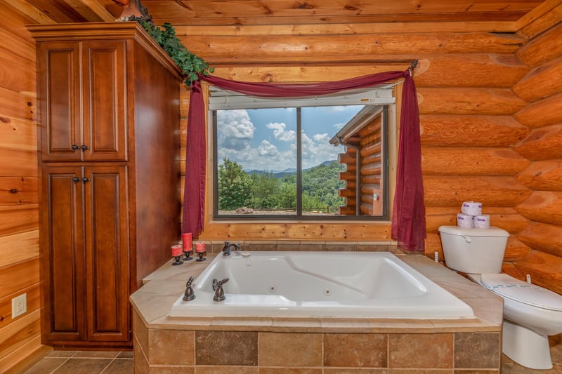 Jacuzzi tub in the bathroom at Gods Country, a 4 bedroom cabin rental located in Pigeon Forge