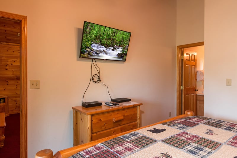 Dresser and TV in a bedroom at Moose Lodge, a 4 bedroom cabin rental located in Sevierville