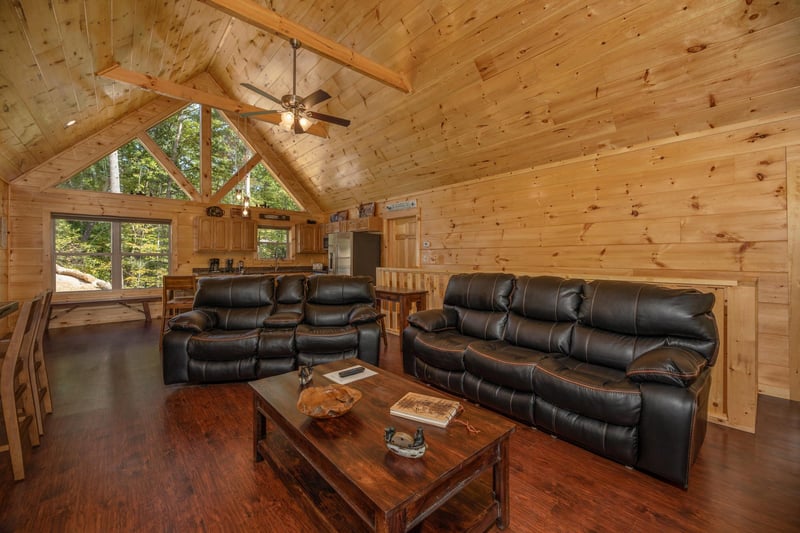 Leather loveseat and sofa in the living room at Gar Bears Hideaway, a 3 bedroom cabin rental located in Pigeon Forge