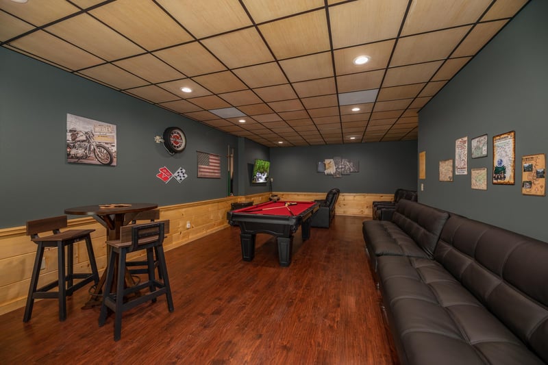 Game room with pub table and pool table at Gar Bears Hideaway, a 3 bedroom cabin rental located in Pigeon Forge