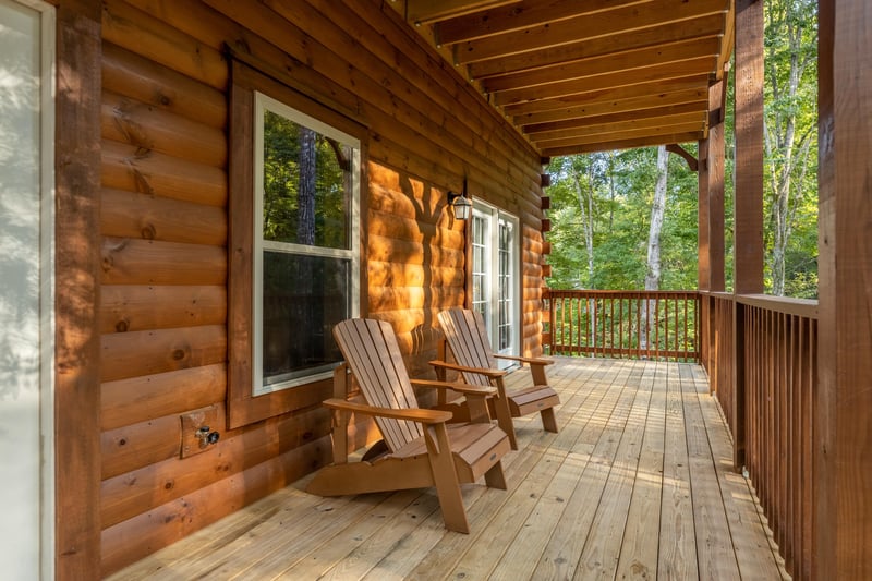 Adirondack chairs on a deck at Gar Bears Hideaway, a Pigeon Forge cabin rental
