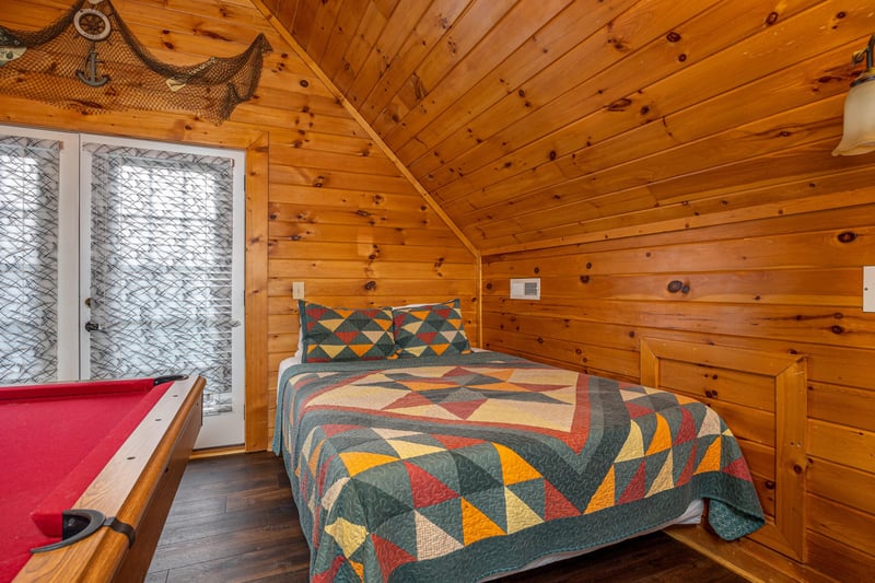 Lofted bedroom at Eagles Nest, a 2 bedroom cabin rental located in Sevierville