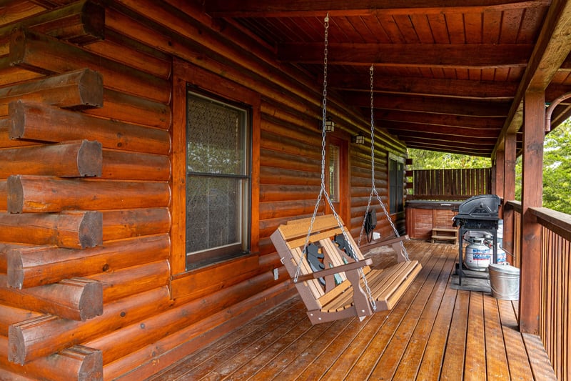 Porch swing at Eagles Nest, a 2bedroom cabin rental located in Sevierville