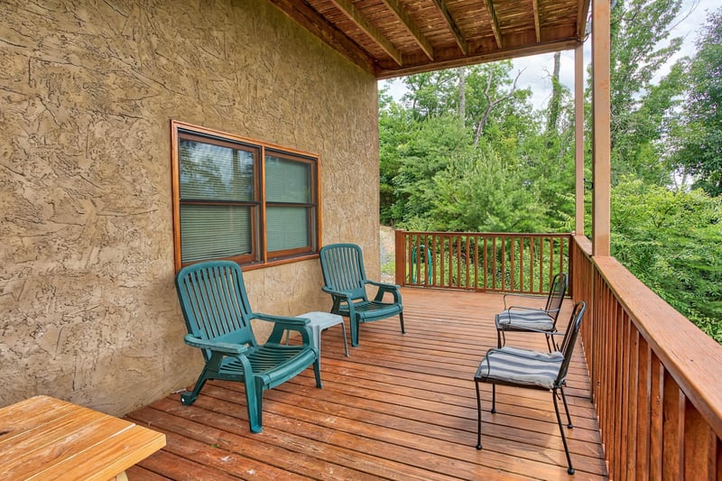 Seating on the deck at I Do Love Views, a 3 bedroom cabin rental located in Pigeon Forge