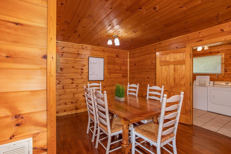 Dining space with seating for six at Cabin Fever, a 4bedroom cabin rental located in Pigeon Forge