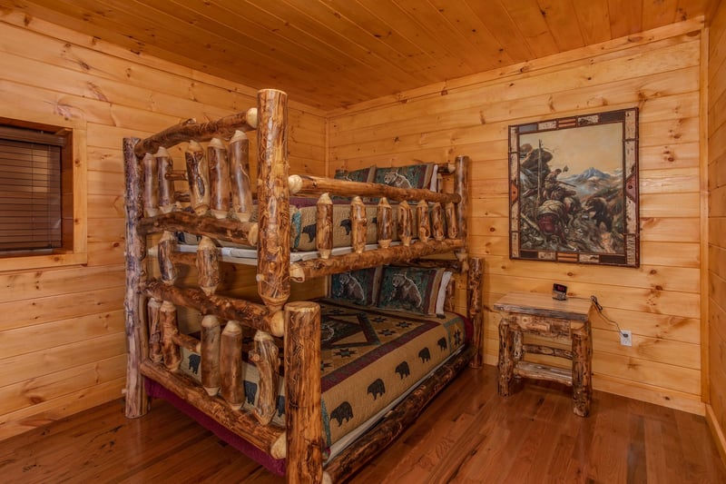 Log bunk bed at Four Seasons Palace, a 5bedroom cabin rental located in Pigeon Forge