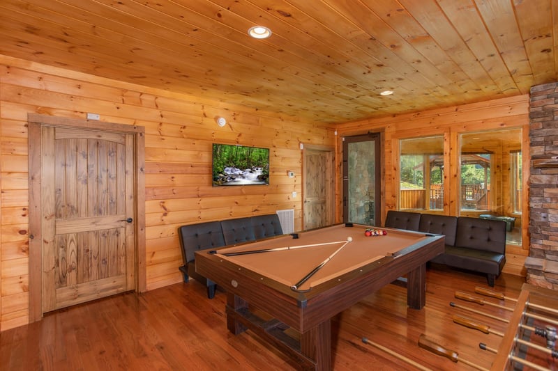 Pool table in the game room at Four Seasons Palace, a 5bedroom cabin rental located in Pigeon Forge