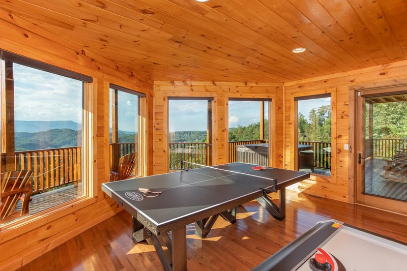 Ping pong table in a game room at Four Seasons Palace, a 5bedroom cabin rental located in Pigeon Forge