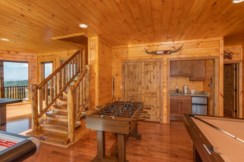 Foosball table in the game room at Four Seasons Palace, a 5bedroom cabin rental located in Pigeon Forge