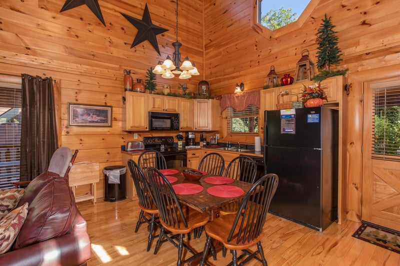 Dining room with seating for six at Bears Eye View, a 2bedroom cabin rental located in Pigeon Forge