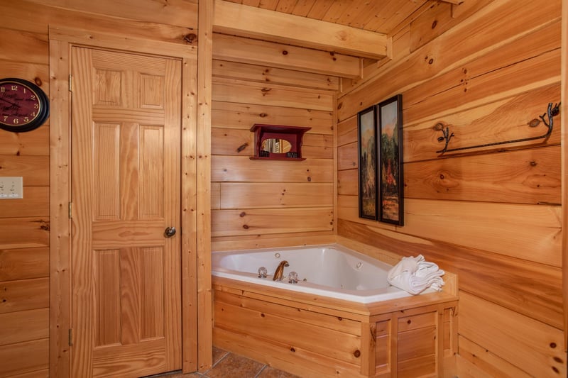 Jacuzzi tub in a corner at Bears Eye View, a 2bedroom cabin rental located in Pigeon Forge