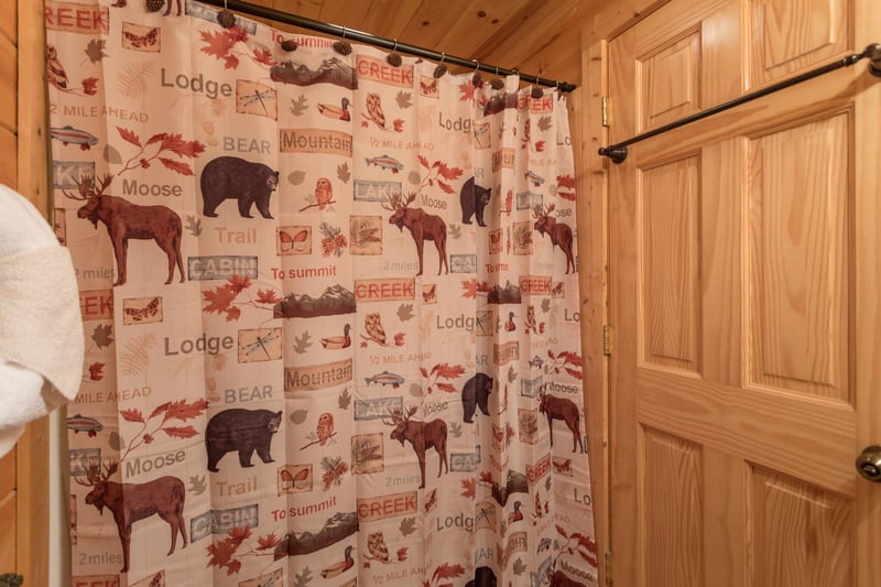 Bathroom with cabin decor at Bears Eye View, a 2bedroom cabin rental located in Pigeon Forge