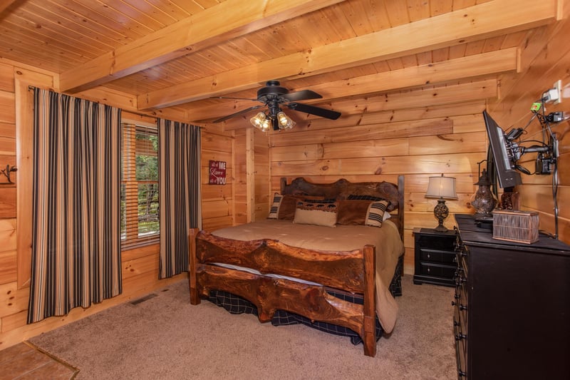 Second bedroom with a wooden bed at Bears Eye View, a 2bedroom cabin rental located in Pigeon Forge