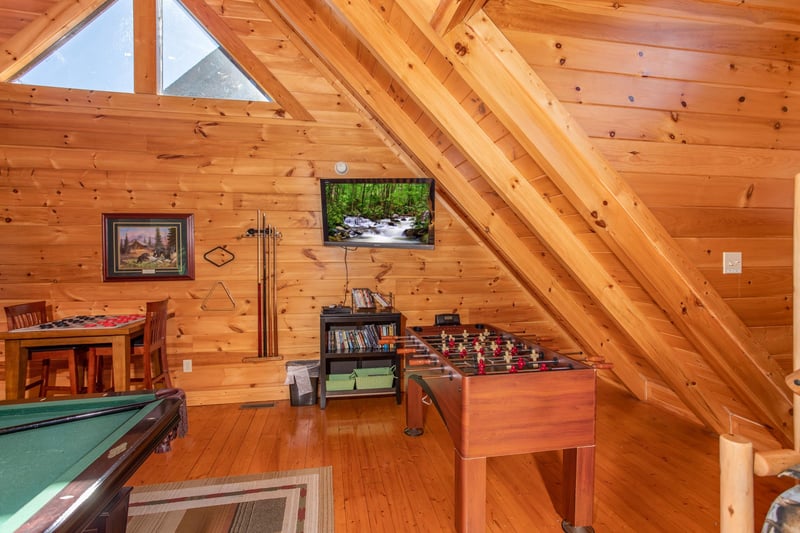 Foosball table in the game loft at Bears Eye View, a 2bedroom cabin rental located in Pigeon Forge