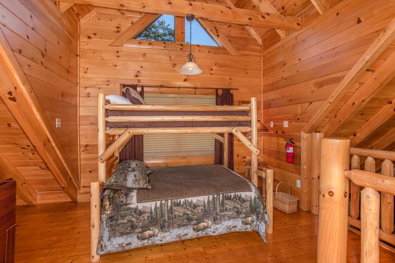 Bunk bed in the game room at Bears Eye View, a 2bedroom cabin rental located in Pigeon Forge