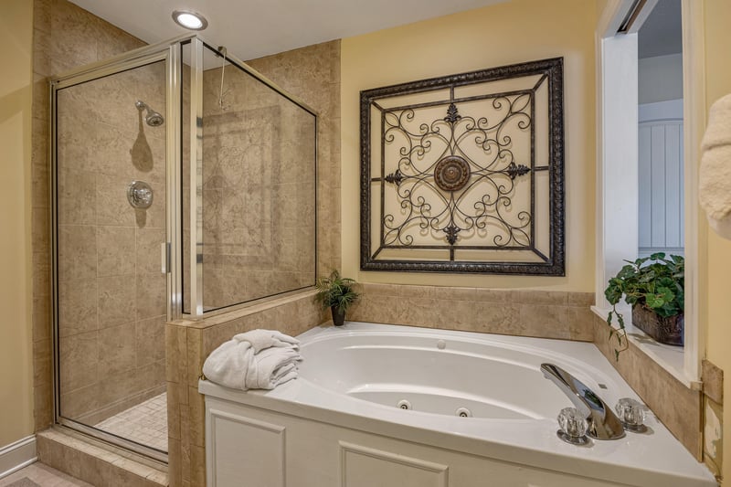 Master bathroom jacuzzi at Heart of Gatlinburg, a 2 bedroom cabin rental located in Gatlinburg